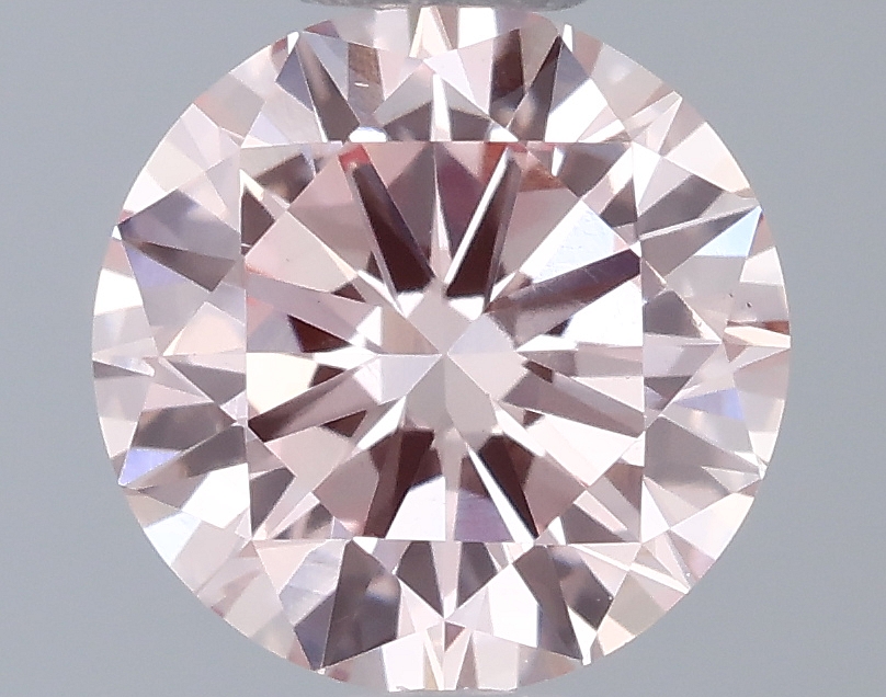 Actual 0.69 carat Intense Pink Round lab-grown diamond