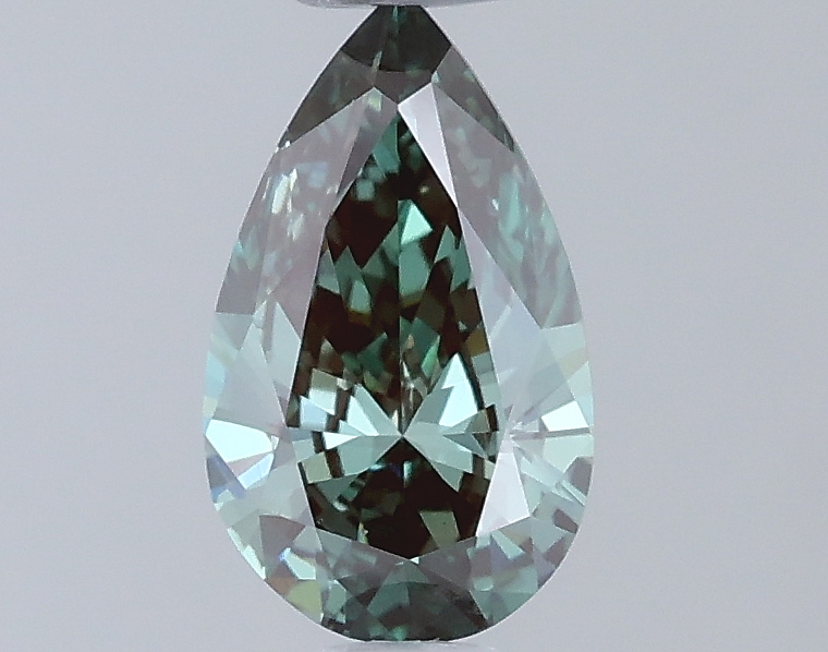 Actual 0.5 carat Fancy Vivid Greenish Green Pear lab-grown diamond