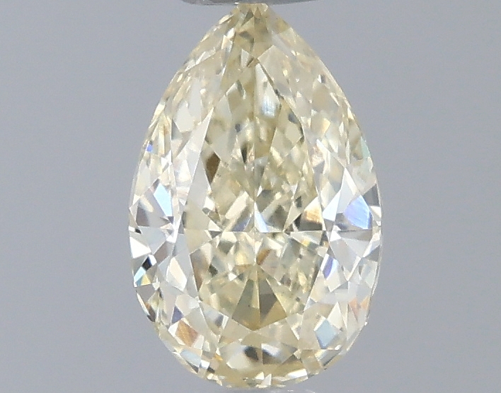Actual 0.52 carat Fancy Light Yellow Pear lab-grown diamond
