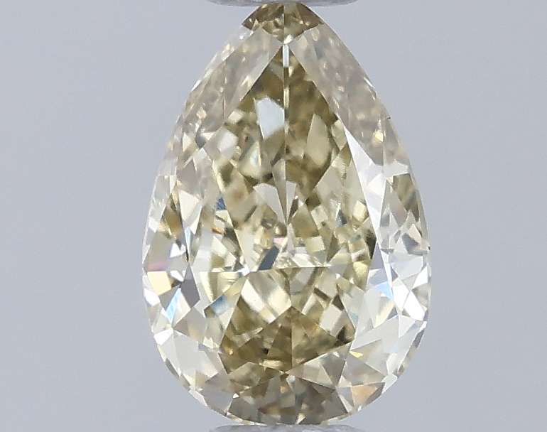 Actual 0.44 carat Fancy Yellow Pear lab-grown diamond